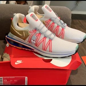 Nike shox Gravity never worn new gold metallic